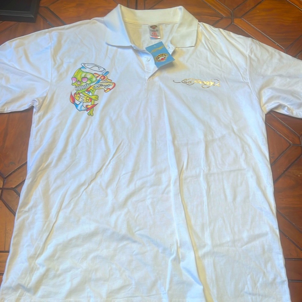 New with tags Christian Audigier t shirt 4XL fits like a XXLarge.